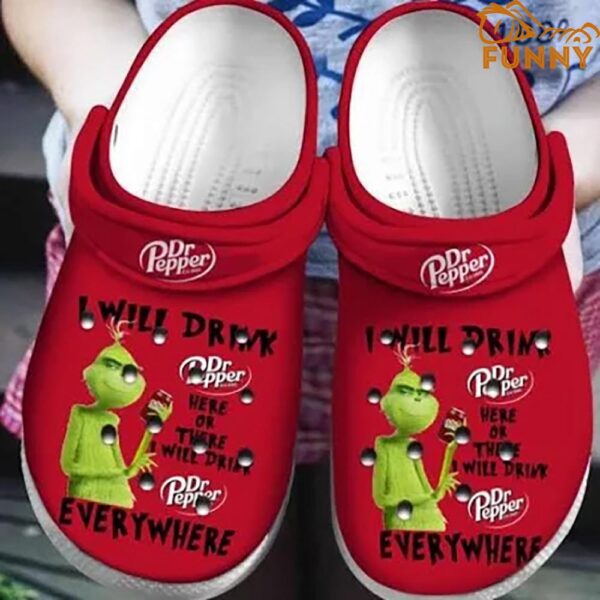 Red Background With Green Grinch Crocs 1.jpg